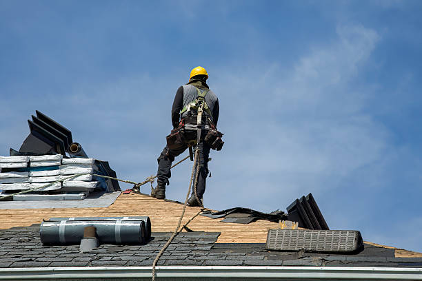 Professional Roofing technician working in Woodburn, OR
